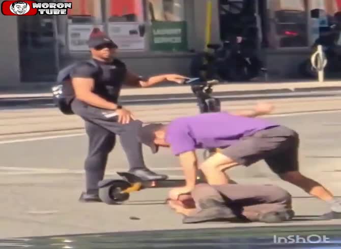 Video :A bystander tries to diffuse the situation after he smashes a man attempting to steal his bike, and the robber grabs his scooter
